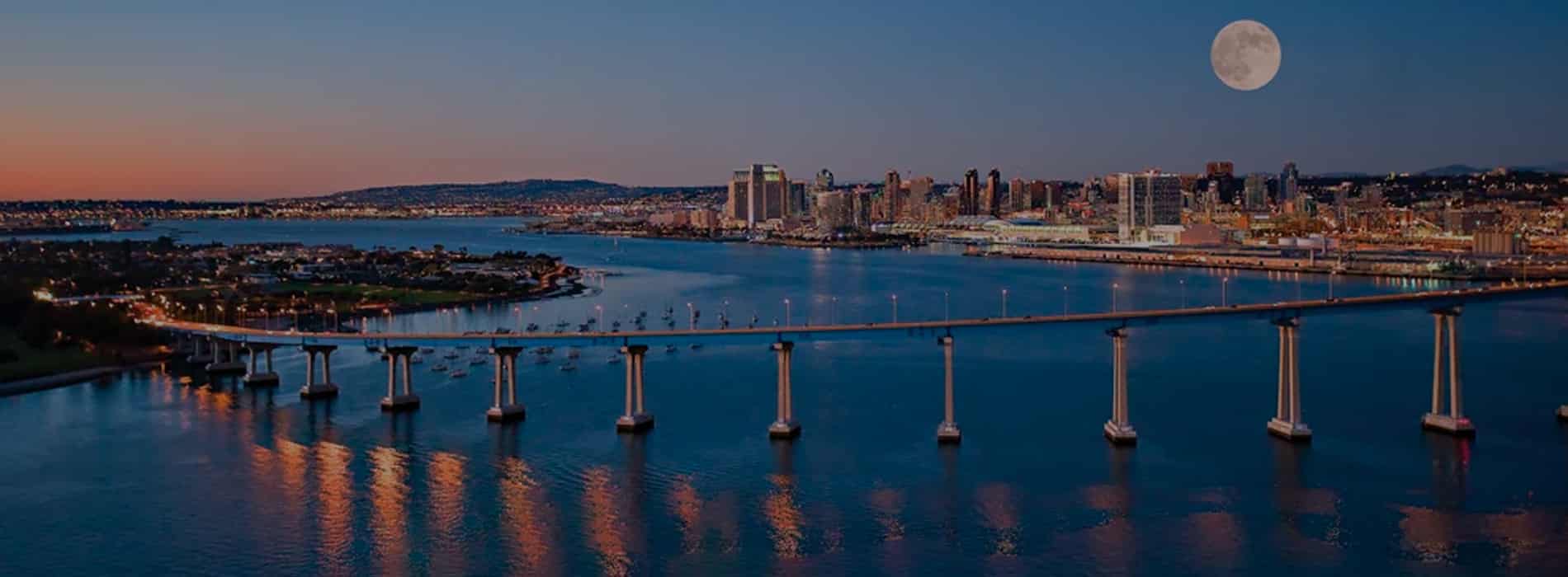 Aerial view of Coronado Bridge in San Diego. Discover homes for sale opportunities with the best real estate agents