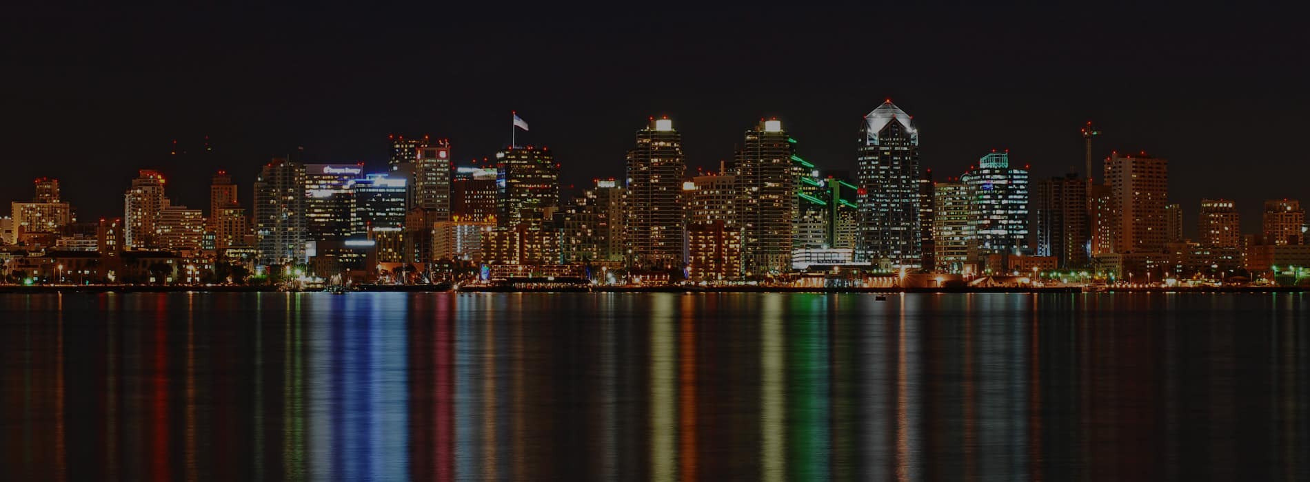 Night view of Downtown San Diego. Discover homes for sale opportunities in Downtown San Diego with the best real estate agents