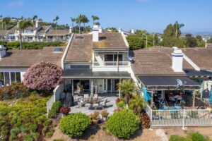 Aerial view of leased home in Carlsbad, San Diego with patio and landscaping.