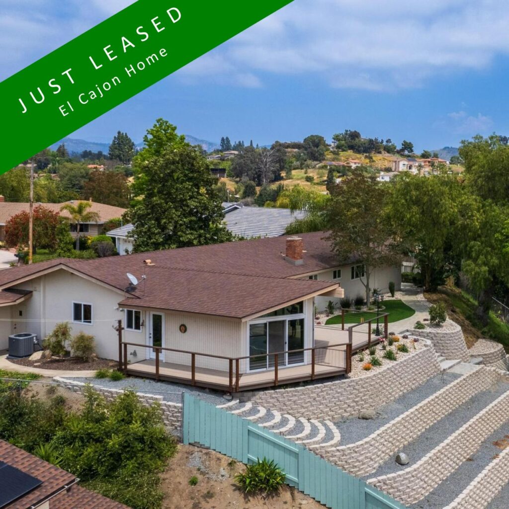 A residential property with a green sign indicating it has been leased in El Cajon San Diego