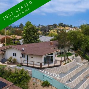 A residential property with a green sign indicating it has been leased in El Cajon San Diego