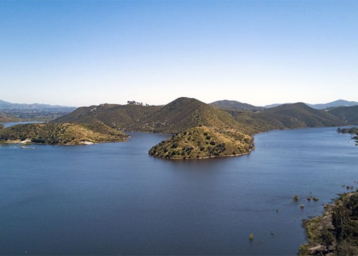 Panoramic view of Lake Hodges. Discover homes for sale opportunities with the best real estate agents in San Diego.