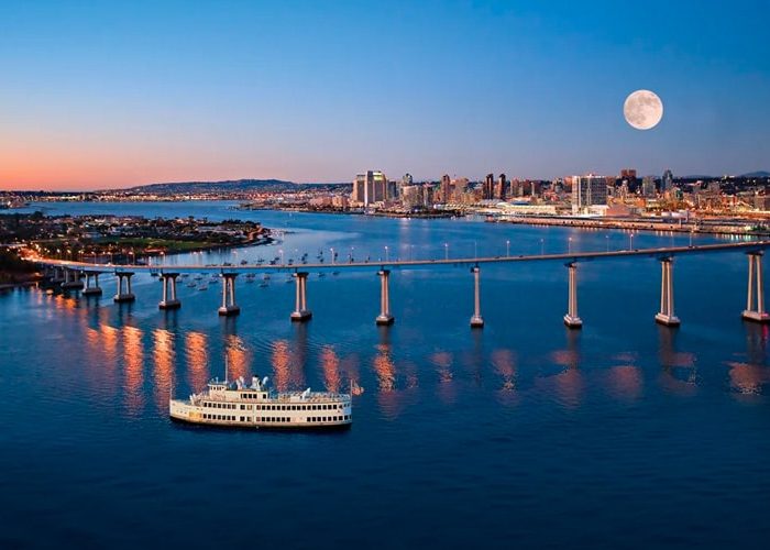 Aerial view of Coronado Bridge in San Diego. Discover homes for sale opportunities with the best real estate agents